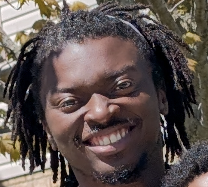 selfie portrait of chibuzor obiora looking seriously at the camera